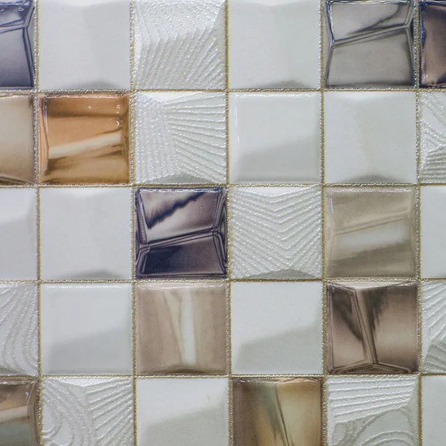 A close up of a tile wall with a geometric pattern.