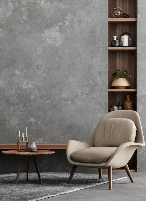 There is a chair and a table in the living room.